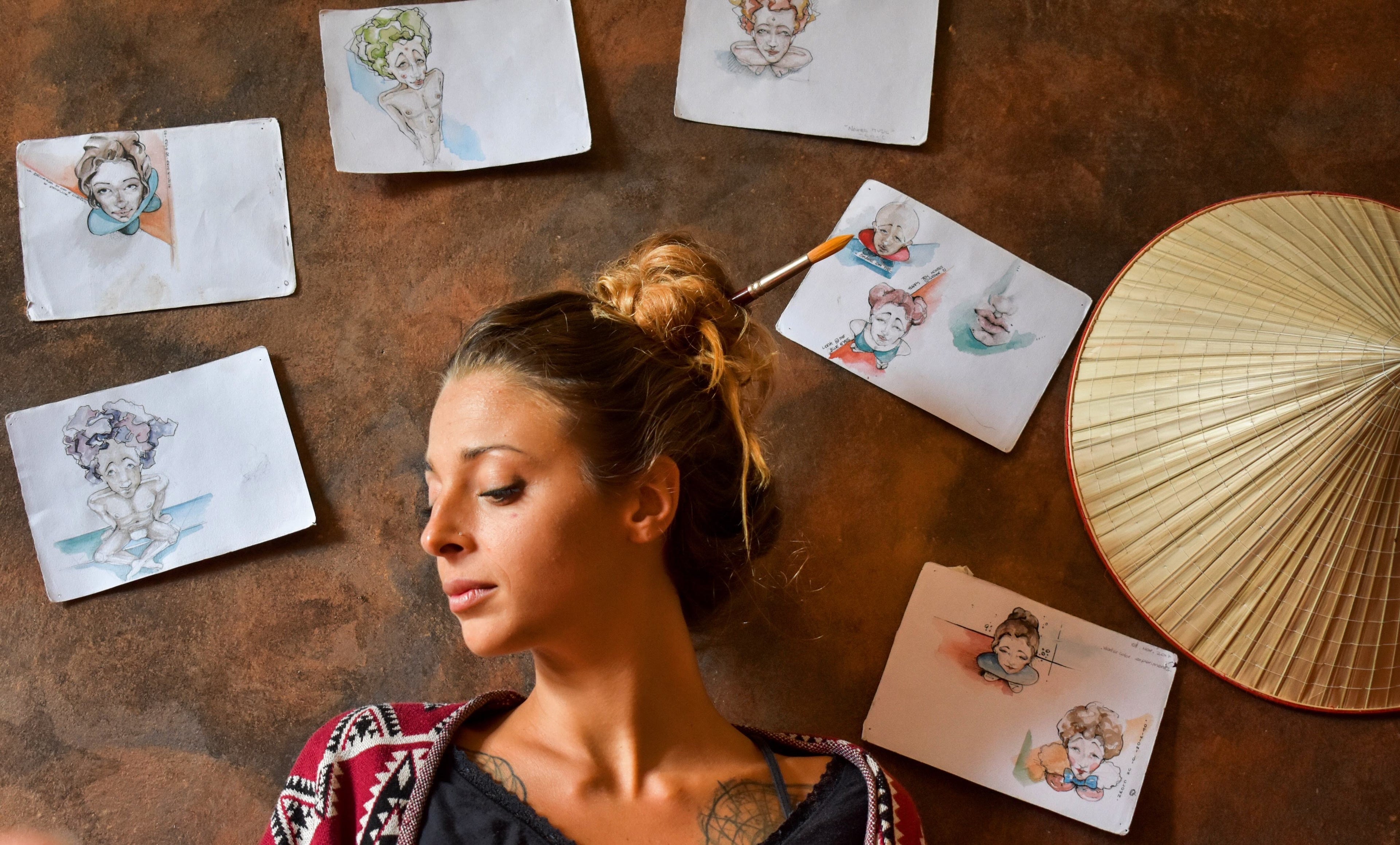 Portrait of artist Daria Rosso in her Berlin studio surrounded by sketches